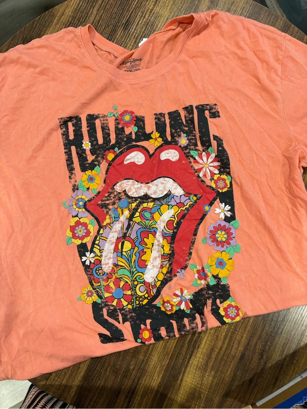 the Rolling Stones Coral Short Sleeve Tee with Psychedelic Tongue Graphic
